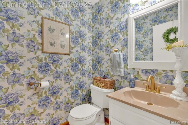 46655 Spruce Dr, Shelby Twp, MI 48315 - bathroom with wallpapered walls and vanity
