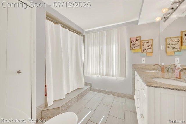 46655 Spruce Dr, Shelby Twp, MI 48315 - bathroom with double vanity and a shower with shower curtain