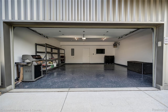 293 N 2nd St Unit 106, Brighton, MI 48116 - garage with electric panel and baseboards