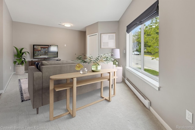 293 N 2nd St Unit 106, Brighton, MI 48116 - dining area with a baseboard heating unit and light colored carpet