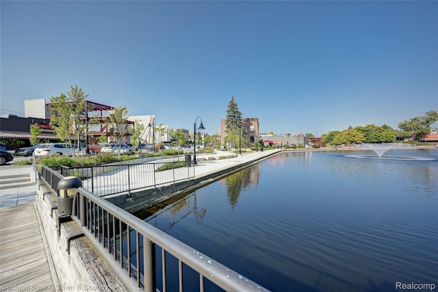 293 N 2nd St Unit 106, Brighton, MI 48116 - dock featuring a water view