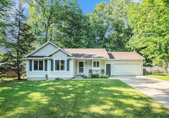 15303 Arborwood Dr, Grand Haven, MI 49417 - ranch-style home with an attached garage, driveway, and roof with shingles