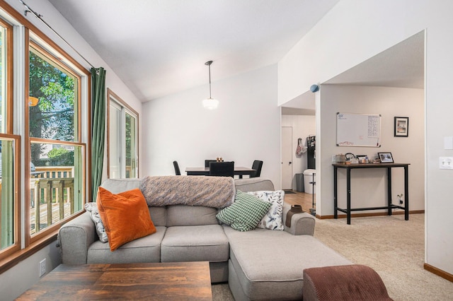 15303 Arborwood Dr, Grand Haven, MI 49417 - living area with vaulted ceiling and carpet flooring