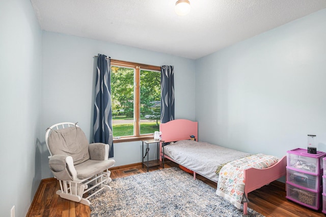 15303 Arborwood Dr, Grand Haven, MI 49417 - bedroom featuring wood finished floors