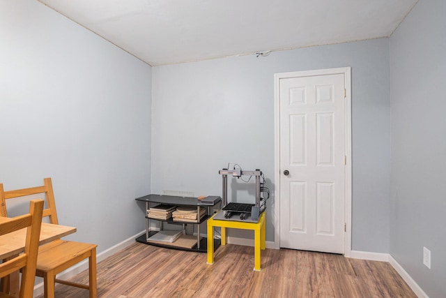 15303 Arborwood Dr, Grand Haven, MI 49417 - misc room featuring wood finished floors and baseboards