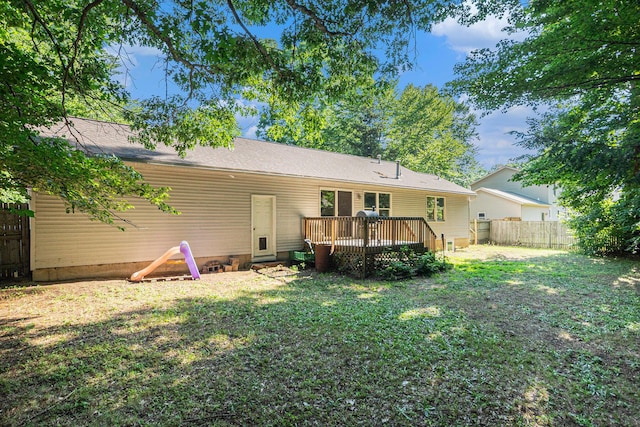15303 Arborwood Dr, Grand Haven, MI 49417 - rear view of property with a wooden deck
