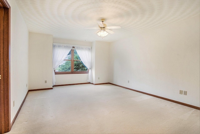 9477 Lightwood Ct, Richland, MI 49083 - empty room featuring light carpet and ceiling fan