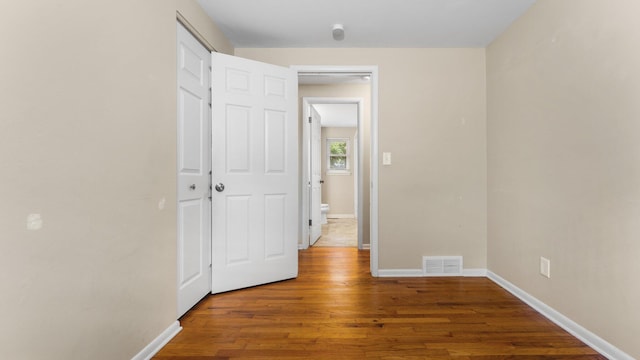 2204 Walter Dr, Ann Arbor, MI 48103 - corridor with wood finished floors and baseboards