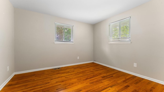 2204 Walter Dr, Ann Arbor, MI 48103 - spare room with plenty of natural light and wood finished floors