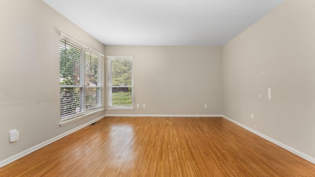 2204 Walter Dr, Ann Arbor, MI 48103 - spare room featuring light wood-style flooring and healthy amount of natural light