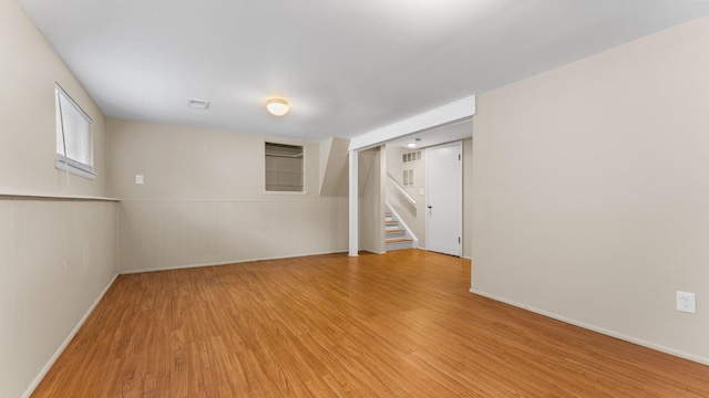 2204 Walter Dr, Ann Arbor, MI 48103 - spare room with light wood-style floors and stairway