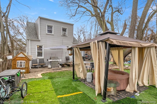25021 Ecorse Rd, Taylor, MI 48180 - rear view of house with a gazebo, a shingled roof, and a yard