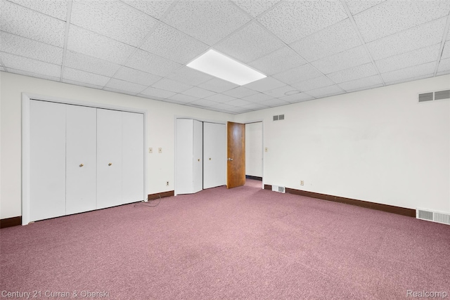 5620 Kaufman St, Dearborn Heights, MI 48125 - unfurnished bedroom featuring carpet floors, multiple closets, and a drop ceiling