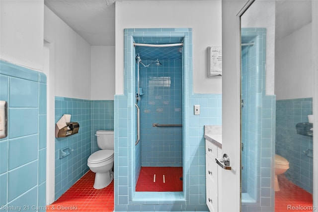 5620 Kaufman St, Dearborn Heights, MI 48125 - full bathroom featuring tile walls, wainscoting, tile patterned flooring, a shower stall, and vanity