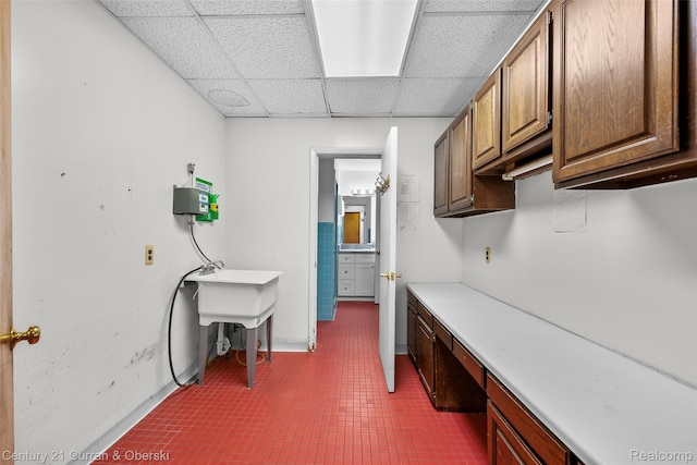 5620 Kaufman St, Dearborn Heights, MI 48125 - laundry area featuring cabinet space