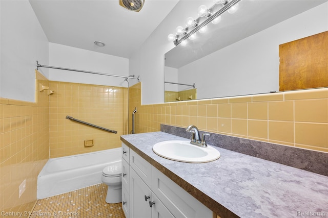 5620 Kaufman St, Dearborn Heights, MI 48125 - bathroom with vanity, tile walls,  shower combination, tile patterned flooring, and backsplash