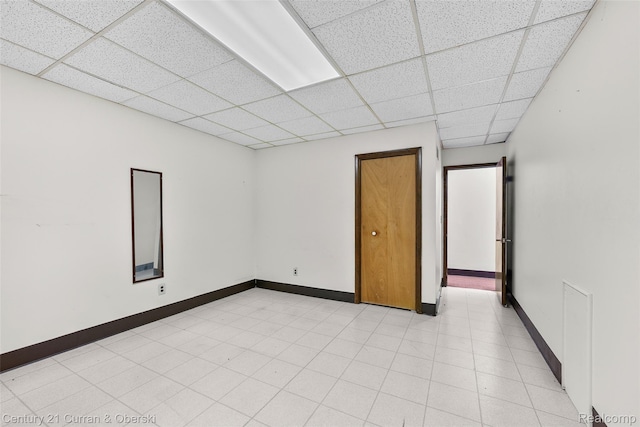 5620 Kaufman St, Dearborn Heights, MI 48125 - unfurnished room with a paneled ceiling and baseboards