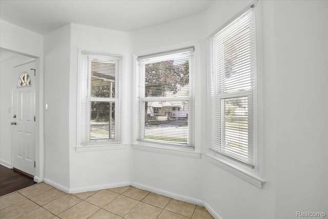 14535 Russell Ave, Allen Park, MI 48101 - unfurnished dining area with light tile patterned floors