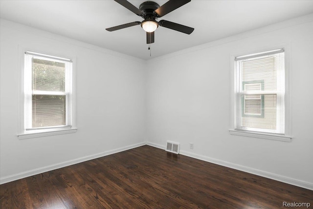14535 Russell Ave, Allen Park, MI 48101 - unfurnished room featuring dark wood-style flooring and a ceiling fan