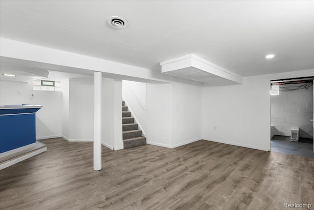 14535 Russell Ave, Allen Park, MI 48101 - below grade area featuring stairway and wood finished floors