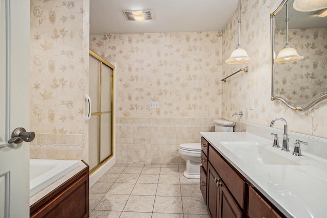 4785 Cottagewood Dr, Kalamazoo, MI 49048 - full bathroom featuring vanity, a stall shower, wallpapered walls, tile patterned flooring, and a tub