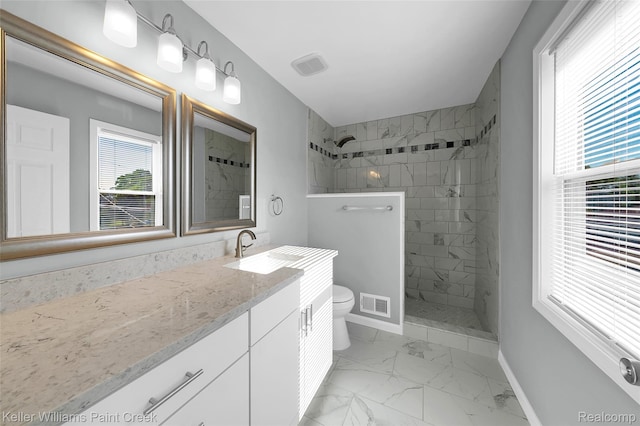 23858 Vassar Ave, Hazel Park, MI 48030 - full bathroom with marble look tile flooring, vanity, walk in shower, and plenty of natural light