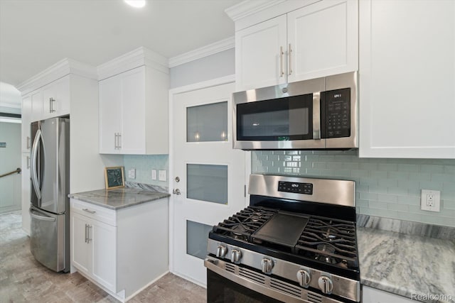 7262 Hatchery Rd, Waterford, MI 48327 - kitchen featuring stainless steel appliances, light stone countertops, white cabinets, tasteful backsplash, and ornamental molding