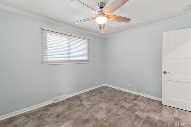 7262 Hatchery Rd, Waterford, MI 48327 - unfurnished room featuring ceiling fan, wood finished floors, crown molding, and a smoke detector