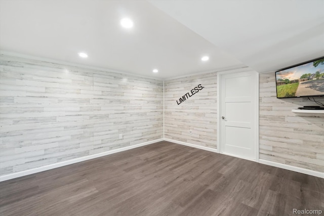 7262 Hatchery Rd, Waterford, MI 48327 - empty room featuring wood finished floors, recessed lighting, and wood walls