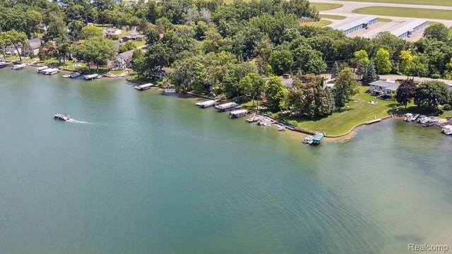 7262 Hatchery Rd, Waterford, MI 48327 - aerial view of a nearby body of water and a tree filled landscape