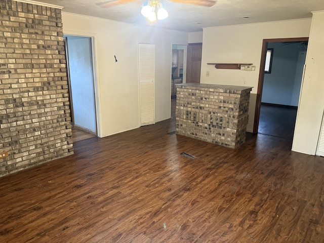 1414 Beard St, Port Huron, MI 48060 - unfurnished living room featuring a ceiling fan, wood finished floors, and ornamental molding
