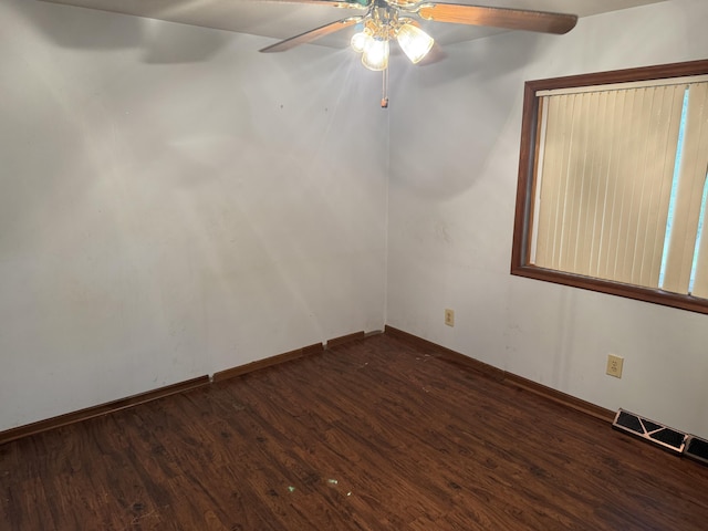 1414 Beard St, Port Huron, MI 48060 - unfurnished room featuring a ceiling fan and dark wood-type flooring