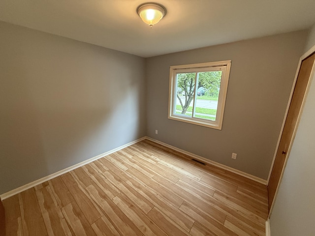 1414 Beard St, Port Huron, MI 48060 - spare room with light wood finished floors