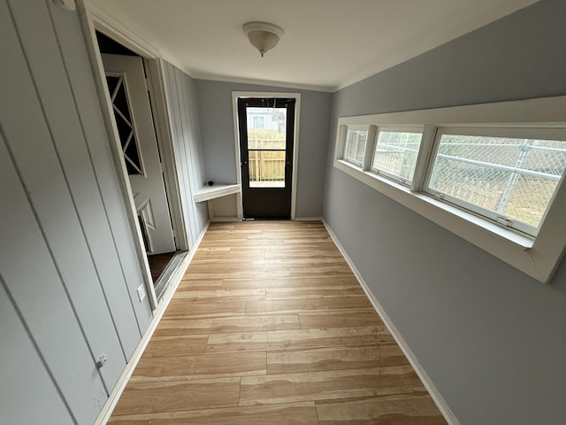 1414 Beard St, Port Huron, MI 48060 - doorway to outside featuring lofted ceiling and light wood-style floors