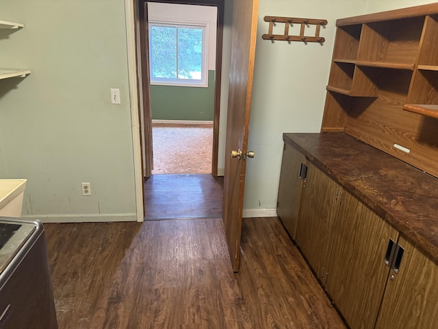 1414 Beard St, Port Huron, MI 48060 - washroom featuring dark wood-style floors and baseboards