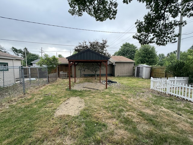 1414 Beard St, Port Huron, MI 48060 - fenced backyard with a storage shed and a gazebo