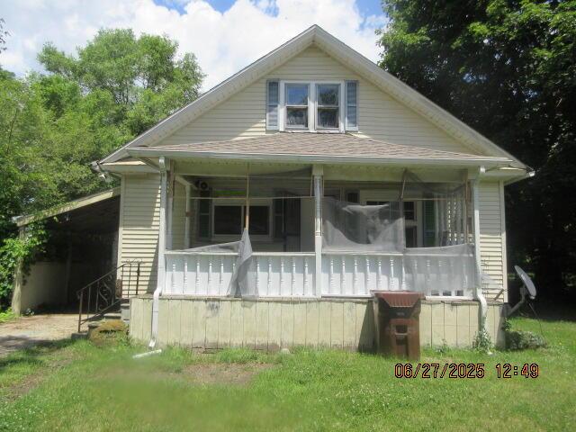 84 Somerset Ave, Battle Creek, MI 49037 - bungalow with a porch
