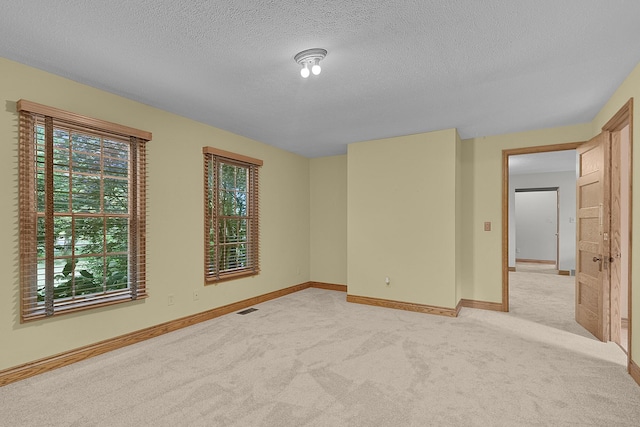 13972 S 5th St, Schoolcraft, MI 49087 - empty room with light colored carpet and a textured ceiling