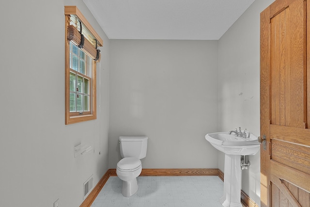 13972 S 5th St, Schoolcraft, MI 49087 - bathroom with toilet and baseboards