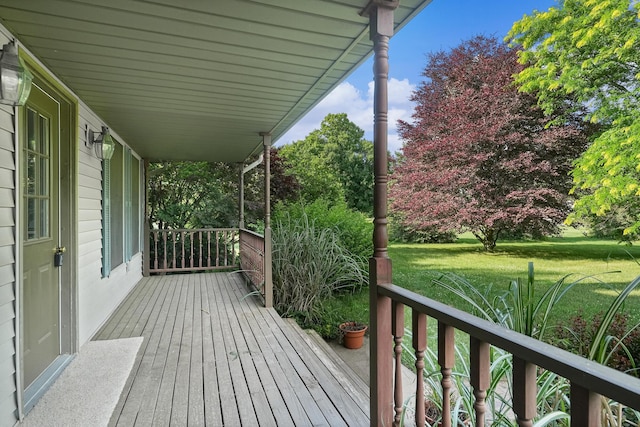 13972 S 5th St, Schoolcraft, MI 49087 - wooden porch with a yard
