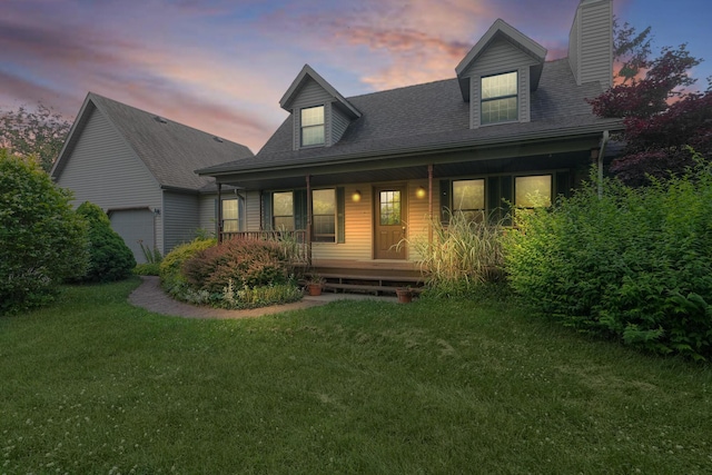 13972 S 5th St, Schoolcraft, MI 49087 - view of front of home with a porch, a chimney, a yard, an attached garage, and a shingled roof