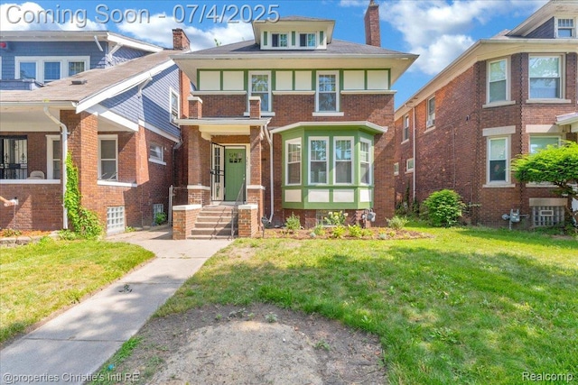 3801 Vicksburg St, Detroit, MI 48206 - traditional style home with a front yard, brick siding, and a chimney