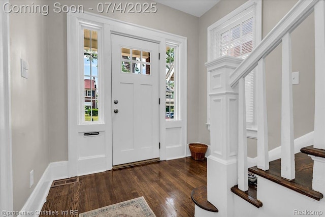 3801 Vicksburg St, Detroit, MI 48206 - foyer entrance with dark wood-style floors, healthy amount of natural light, and stairs