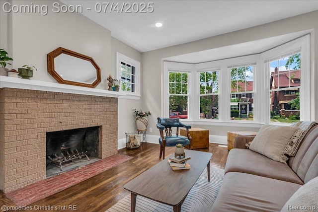 3801 Vicksburg St, Detroit, MI 48206 - living area with wood finished floors, a fireplace, and recessed lighting