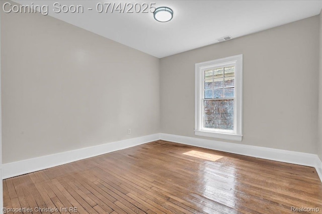 3801 Vicksburg St, Detroit, MI 48206 - spare room with baseboards and wood-type flooring