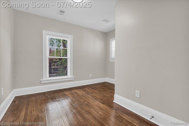 3801 Vicksburg St, Detroit, MI 48206 - spare room with baseboards and wood-type flooring