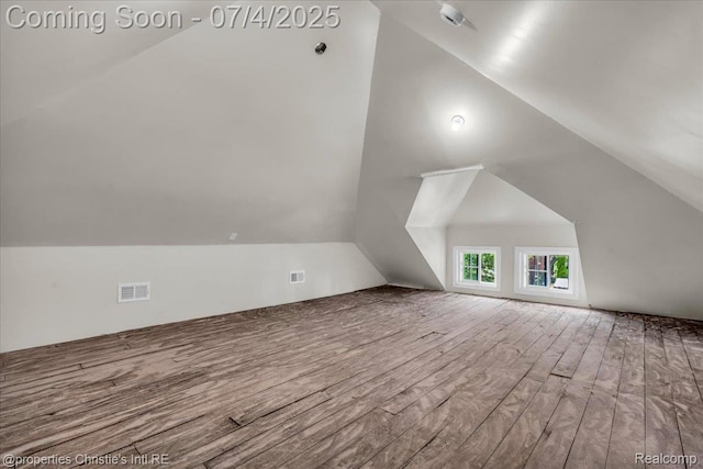 3801 Vicksburg St, Detroit, MI 48206 - additional living space featuring vaulted ceiling and wood finished floors