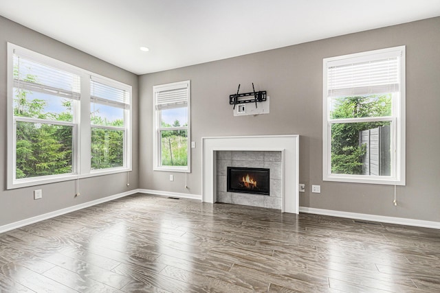 4047 Enclave Way Unit 1, Kalamazoo, MI 49006 - unfurnished living room featuring wood finished floors, a fireplace, and recessed lighting