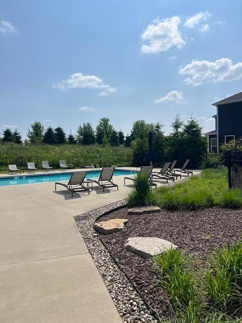 4047 Enclave Way Unit 1, Kalamazoo, MI 49006 - community pool with a patio area