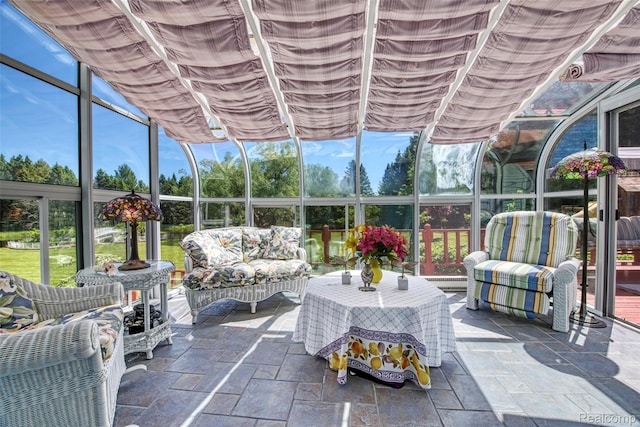 24559 S Klingville Rd, Chassell, MI 49916 - sunroom featuring an outdoor hangout area and healthy amount of natural light